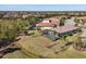 Aerial view of community with houses and golf course at 16442 Hillside Cir, Lakewood Ranch, FL 34202