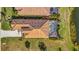 Bird's eye view of a home with pool and a lake view at 17404 Hickok Belt Loop, Bradenton, FL 34211