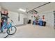 Spacious garage with overhead storage and room for bikes at 17404 Hickok Belt Loop, Bradenton, FL 34211