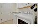 Bright laundry room with washer, dryer, and utility sink at 17404 Hickok Belt Loop, Bradenton, FL 34211