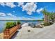 Community kayak launch with a dock and lush landscaping at 23633 Copperleaf Dr, Venice, FL 34293