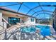 Enjoy this beautiful pool and spa with screened enclosure at 23633 Copperleaf Dr, Venice, FL 34293