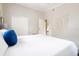 Bright bedroom with queen-size bed and closet at 2820 Novus St, Sarasota, FL 34237