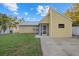 Cute yellow house with a screened porch at 305 N Conrad Ave, Sarasota, FL 34237