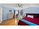 Bedroom with hardwood floors, and ceiling fan at 4132 Carriage Cir # 12, Sarasota, FL 34241