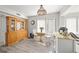 Bright breakfast nook with wood hutch and small table, perfect for morning coffee at 4132 Carriage Cir # 12, Sarasota, FL 34241