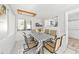 Casual dining area with a table and chairs, adjacent to kitchen at 4132 Carriage Cir # 12, Sarasota, FL 34241