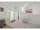 Bright and spacious entryway with tile flooring at 4132 Carriage Cir # 12, Sarasota, FL 34241