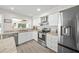 Modern kitchen with stainless steel appliances and granite countertops at 4132 Carriage Cir # 12, Sarasota, FL 34241