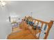 Wooden staircase overlooking the living room at 4132 Carriage Cir # 12, Sarasota, FL 34241