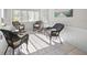 Relaxing sunroom with wicker chairs and ample natural light at 4132 Carriage Cir # 12, Sarasota, FL 34241