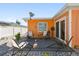 Small patio with chairs and table at 426 62Nd St, Holmes Beach, FL 34217