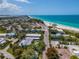 Aerial view of beachside property with oceanfront access and resort amenities at 4307 Gulf Dr # 103, Holmes Beach, FL 34217