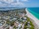 Aerial view of neighborhood and coastline at 4307 Gulf Dr # 103, Holmes Beach, FL 34217
