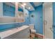 Bright bathroom with a glass-enclosed shower, stylish vanity, and cheerful decor at 4307 Gulf Dr # 103, Holmes Beach, FL 34217