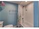 Clean bathroom with white subway tile shower and floral shower curtain at 4307 Gulf Dr # 103, Holmes Beach, FL 34217