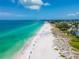 Aerial view of beach with clear water and white sand at 4307 Gulf Dr # 103, Holmes Beach, FL 34217