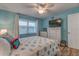 Guest bedroom with queen-size bed and a dresser at 4307 Gulf Dr # 103, Holmes Beach, FL 34217