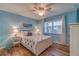 Guest bedroom with a queen-size bed and light blue walls at 4307 Gulf Dr # 103, Holmes Beach, FL 34217