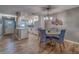 Dining area with round table and chairs, adjacent to the kitchen at 4307 Gulf Dr # 103, Holmes Beach, FL 34217
