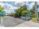 Building exterior showcasing parking and landscaping at 4307 Gulf Dr # 103, Holmes Beach, FL 34217
