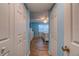 Bright bedroom with wood floors featuring closet space and white furniture at 4307 Gulf Dr # 103, Holmes Beach, FL 34217