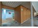 Covered parking area with individual unit access and overhead structure at 4307 Gulf Dr # 103, Holmes Beach, FL 34217
