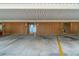 View of covered parking spaces for the building's residents at 4307 Gulf Dr # 103, Holmes Beach, FL 34217