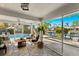 Relaxing screened porch overlooking the canal and pool at 4820 Higel Ave, Sarasota, FL 34242