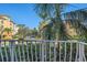 View from balcony showcasing the community's lush landscaping and building exteriors at 6482 Water Crest Way # 204, Lakewood Ranch, FL 34202