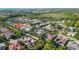 Aerial view of single Gathering home with pool in a luxury community at 710 Shadow Bay Way, Osprey, FL 34229