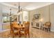 Elegant dining room featuring a large table and hardwood floors at 7531 Rio Bella Pl, Bradenton, FL 34201