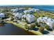 Luxury waterfront community with multiple buildings and lush landscaping at 7830 34Th W Ave # 102, Bradenton, FL 34209