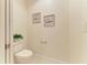 Small half bathroom with toilet and pedestal sink at 7830 34Th W Ave # 102, Bradenton, FL 34209