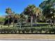 Fenced dog park with mature palm trees at 7830 34Th W Ave # 102, Bradenton, FL 34209