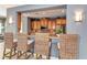 Kitchen with breakfast bar and wood cabinets at 7830 34Th W Ave # 102, Bradenton, FL 34209