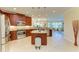 Open concept kitchen boasting granite countertops and stainless steel appliances at 7830 34Th W Ave # 102, Bradenton, FL 34209