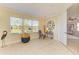 Sunroom with windows offering garden views and a comfortable seating area at 7830 34Th W Ave # 102, Bradenton, FL 34209