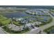 Aerial view of community pool, tennis, and clubhouse at 7940 Redonda Loop, Bradenton, FL 34202