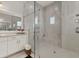 Large walk-in shower with multiple shower heads and bench seating at 7940 Redonda Loop, Bradenton, FL 34202