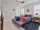 Bright bedroom with a comfortable bed, stylish decor, and plenty of natural light at 7940 Redonda Loop, Bradenton, FL 34202