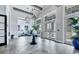 Elegant clubhouse entrance with stylish flooring and lighting at 7940 Redonda Loop, Bradenton, FL 34202