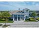 Community clubhouse with attractive architectural details and landscaping at 7940 Redonda Loop, Bradenton, FL 34202