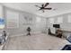 Home office with a built-in desk, plenty of natural light and hardwood floors at 7940 Redonda Loop, Bradenton, FL 34202