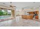 Kitchen with stainless steel appliances and pool view at 8356 Mareva Ln, Sarasota, FL 34241