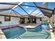 Enclosed pool and spa with patio; great for relaxation and entertaining at 9025 Hilolo Ln, Venice, FL 34293