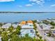 Aerial view of beach house, ocean, and neighborhood at 106 7Th S St, Bradenton Beach, FL 34217