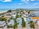Beachfront property aerial view showcasing the home and neighborhood at 106 7Th S St, Bradenton Beach, FL 34217