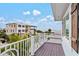 Private balcony overlooking ocean and neighborhood at 106 7Th S St, Bradenton Beach, FL 34217