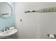 Small bathroom with pedestal sink at 106 7Th S St, Bradenton Beach, FL 34217